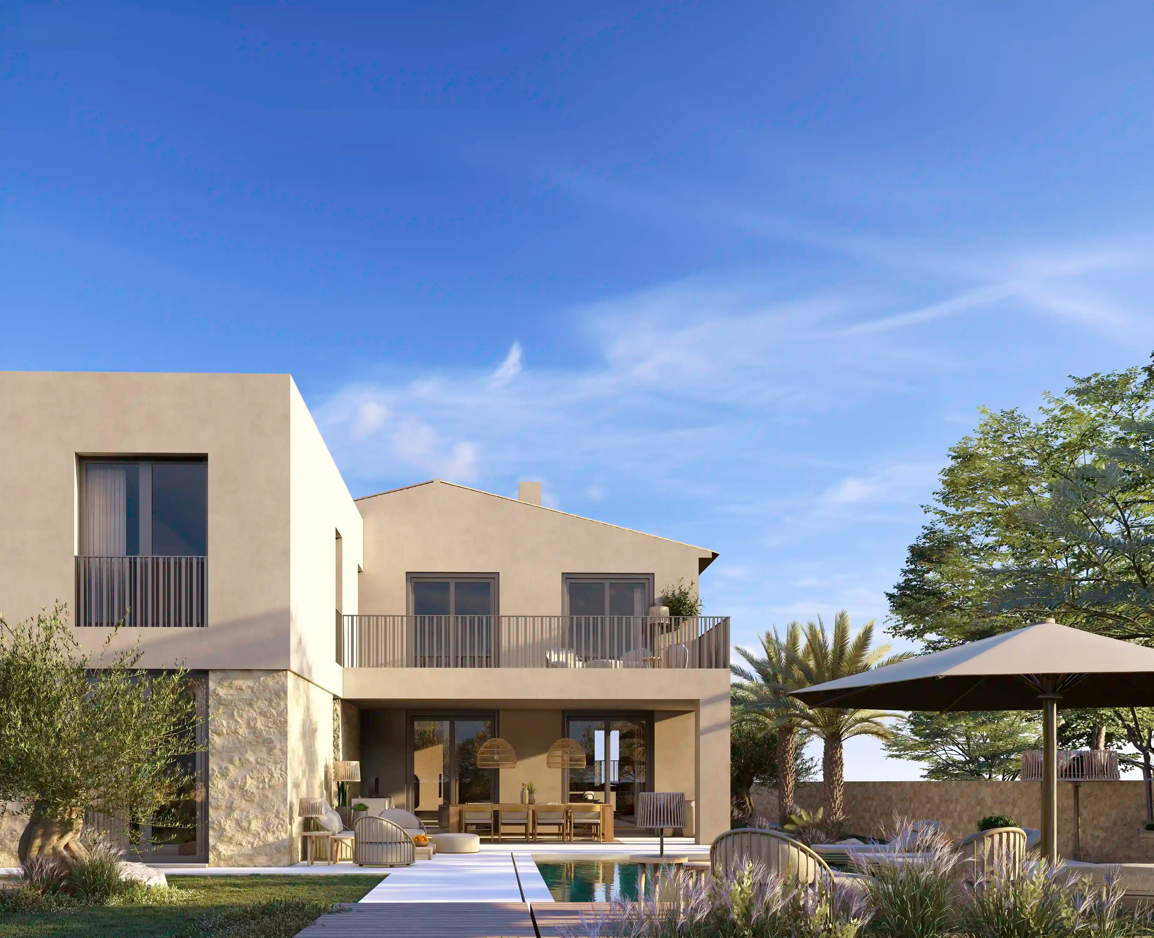 Modern house with a pool and outdoor furniture under a clear blue sky.